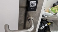 qr code on metal lock on fire door